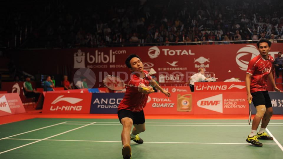 Mohammad Ahsan/Hendra Setiawan susah payah ke babak ketiga setelah dipaksa wakil Prancis Baptiste Careme/Ronan Labar bermain tiga set.